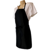 Side view of Black apron with 3 pockets, neck strap, tie around waist. Chemical/bleach safe.